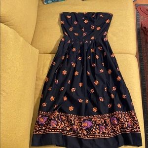 Vintage midi dress with pleated skirt